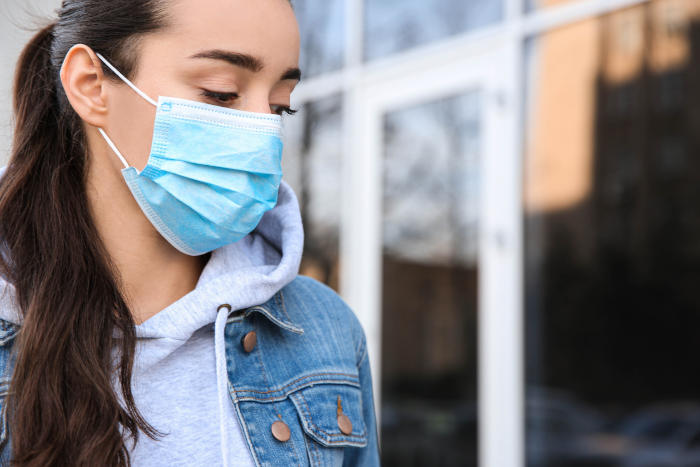 Girl wearing surgical masks